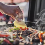 Weber Traveler 22 In. 2-Burner Propane Gas Griddle Flat Top Grill, Black